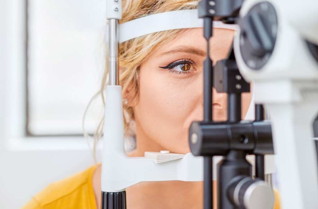 Close-up of a woman undergoing a slit-lamp exam